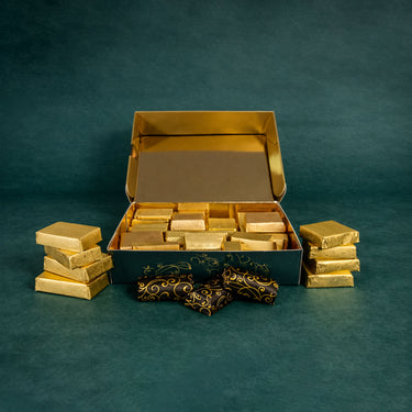 Souriana Schokolade in Stücken, in der geöffneten Verpackung präsentiert